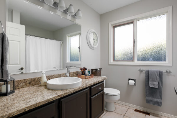935 Monashee Place bathroom with vanity